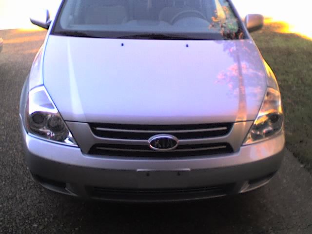 Headlight replacement of a 2007-9 Kia Sedona or Hyundai Entourage