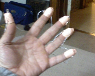 Finger Lights for Night Time Communication for the Deaf.