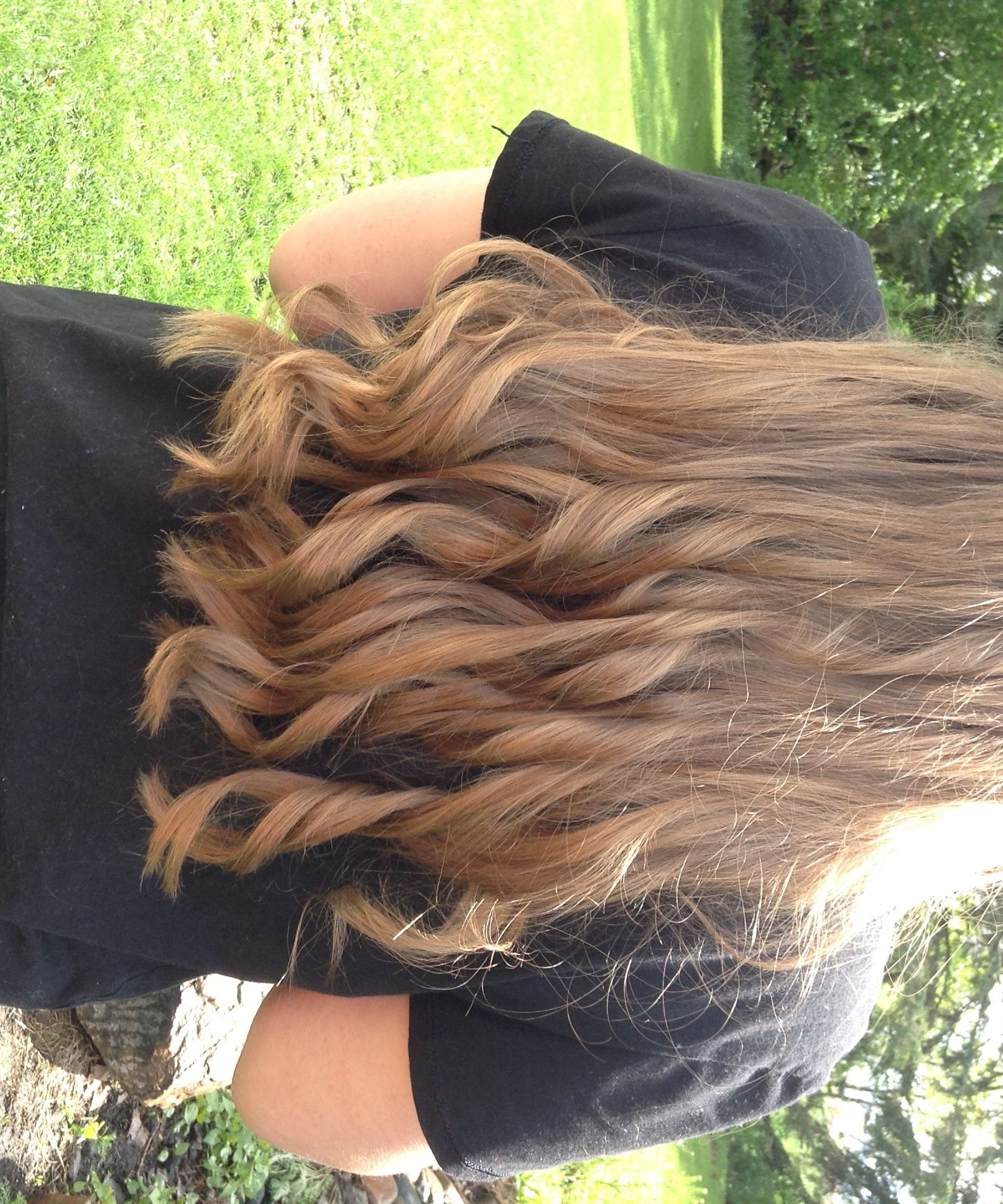 How To: Curl With a Flat Iron