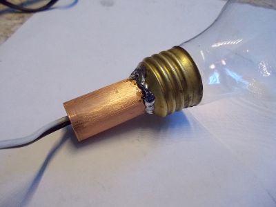 Glue the Light Bulbs to the Copper Pipes