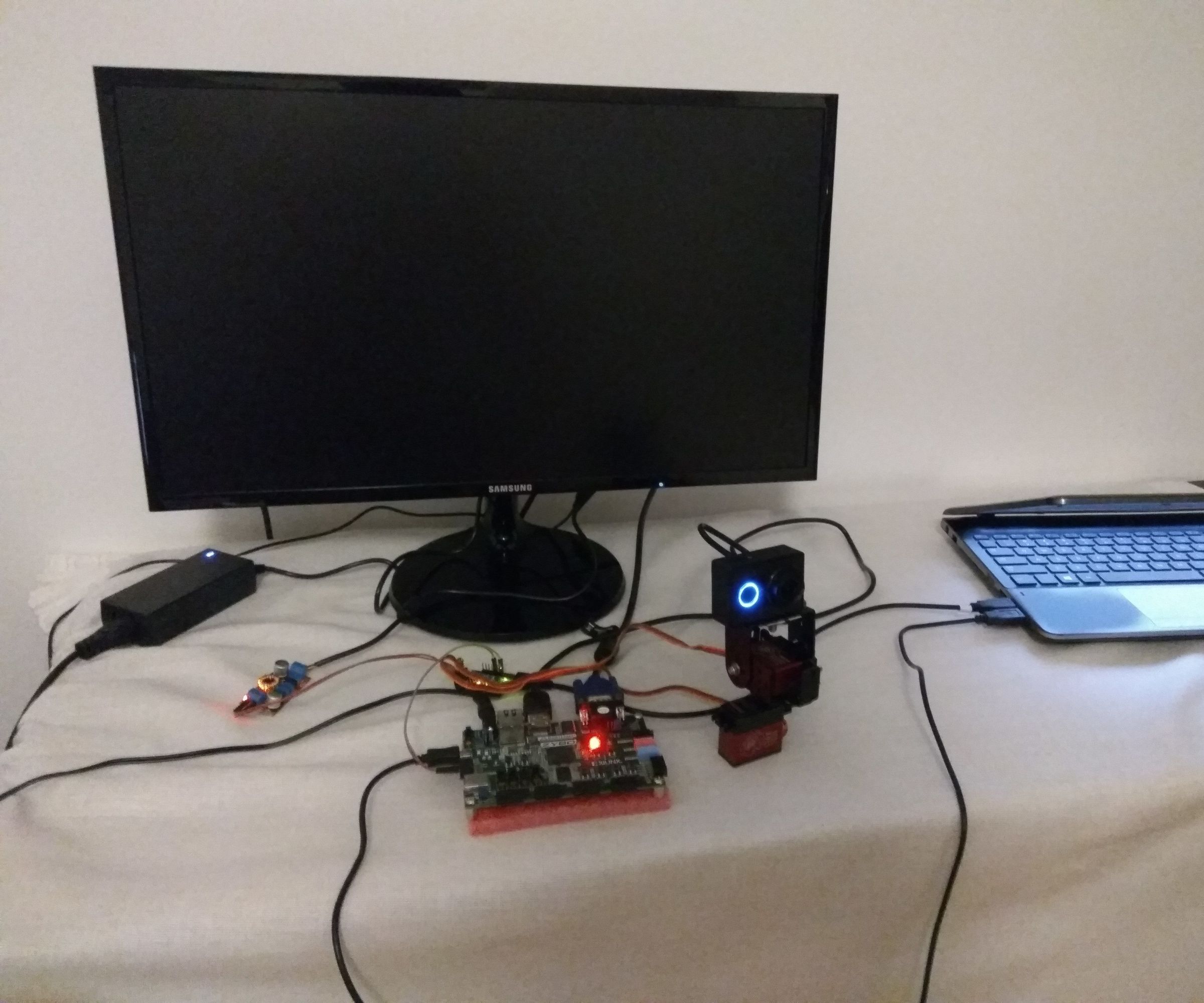 An Object Tracking Pan-tilt Smart Camera Based on Zynq Heterogeneous Device