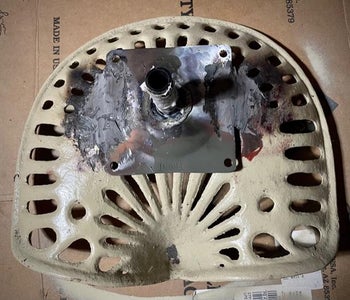 Attach Tractor Seats to Stool Shaft