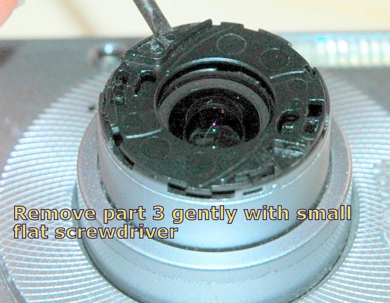 Remove the Parts Covering the Lens of Canon IXUS Digital Camera