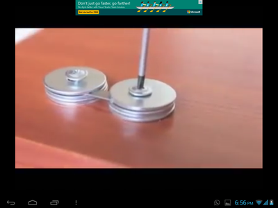 PUT THE SHARPENER BLADE IN THE MIDDLE OF WASHERS AS SHOWN IN THE PICTURE.