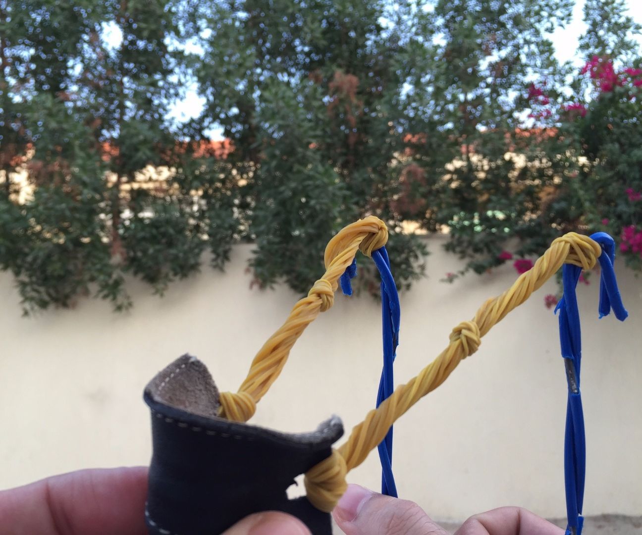 Powerful Slingshot From Laundry Hangers! (Video)