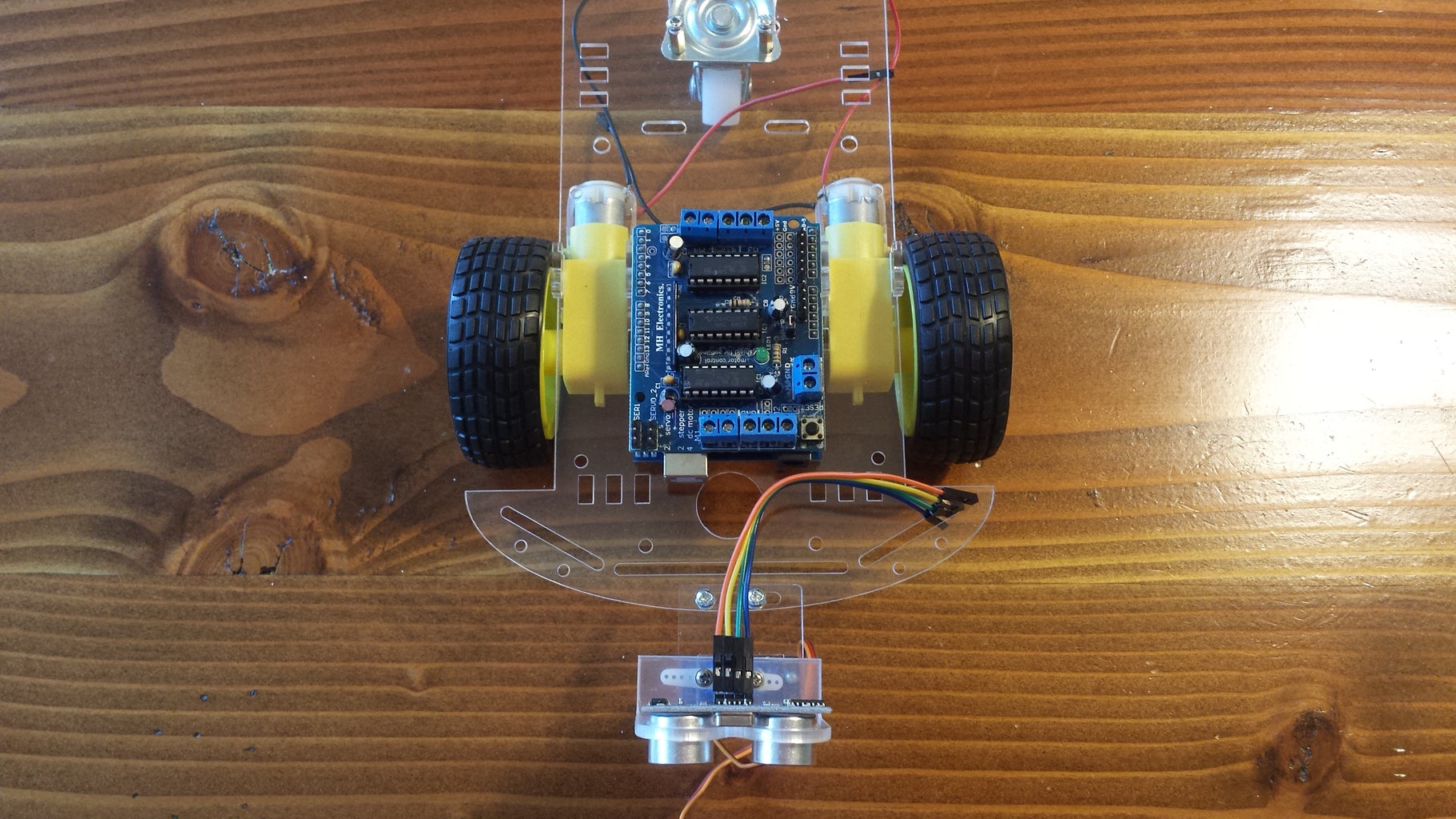 Attach Arduino Uno and Motor Drive Shield to Chassis