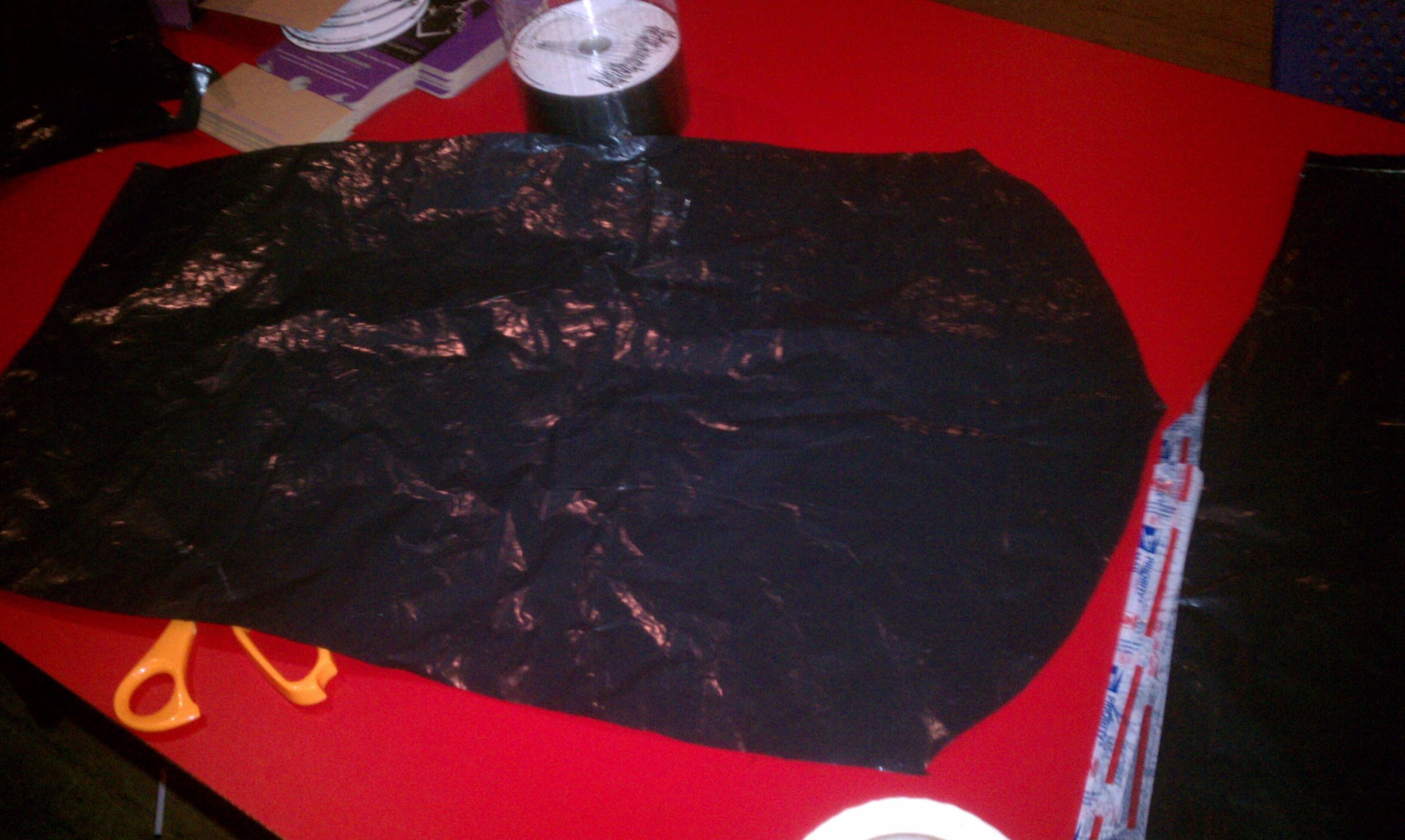 Quick Stylish Raincoat Out of Garbage Bag and USPS Tape 7