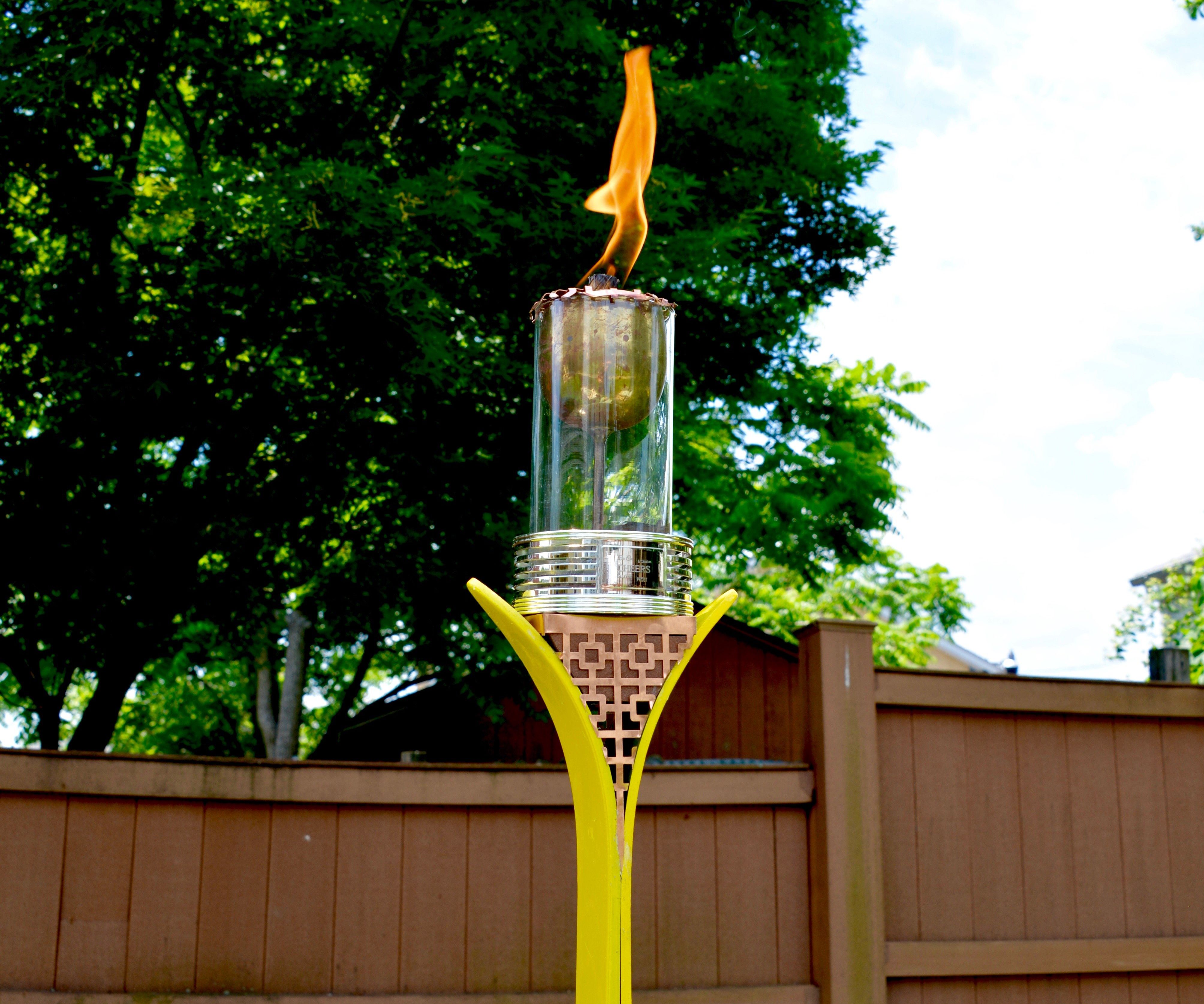 How to Make a DIY Tiki Torch From Snow Skis