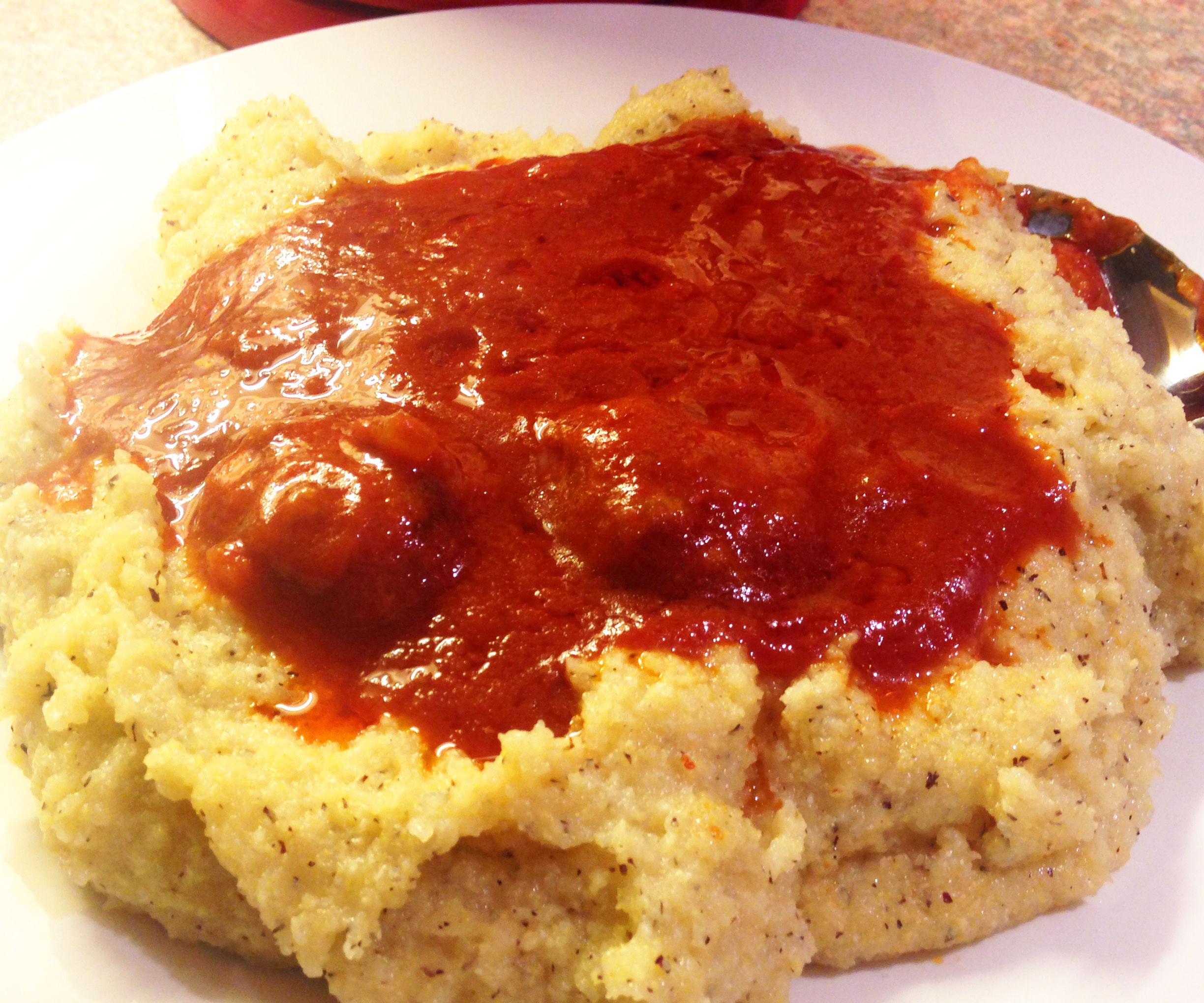 Traditional Italian Meatballs in Tomato Sauce and Polenta