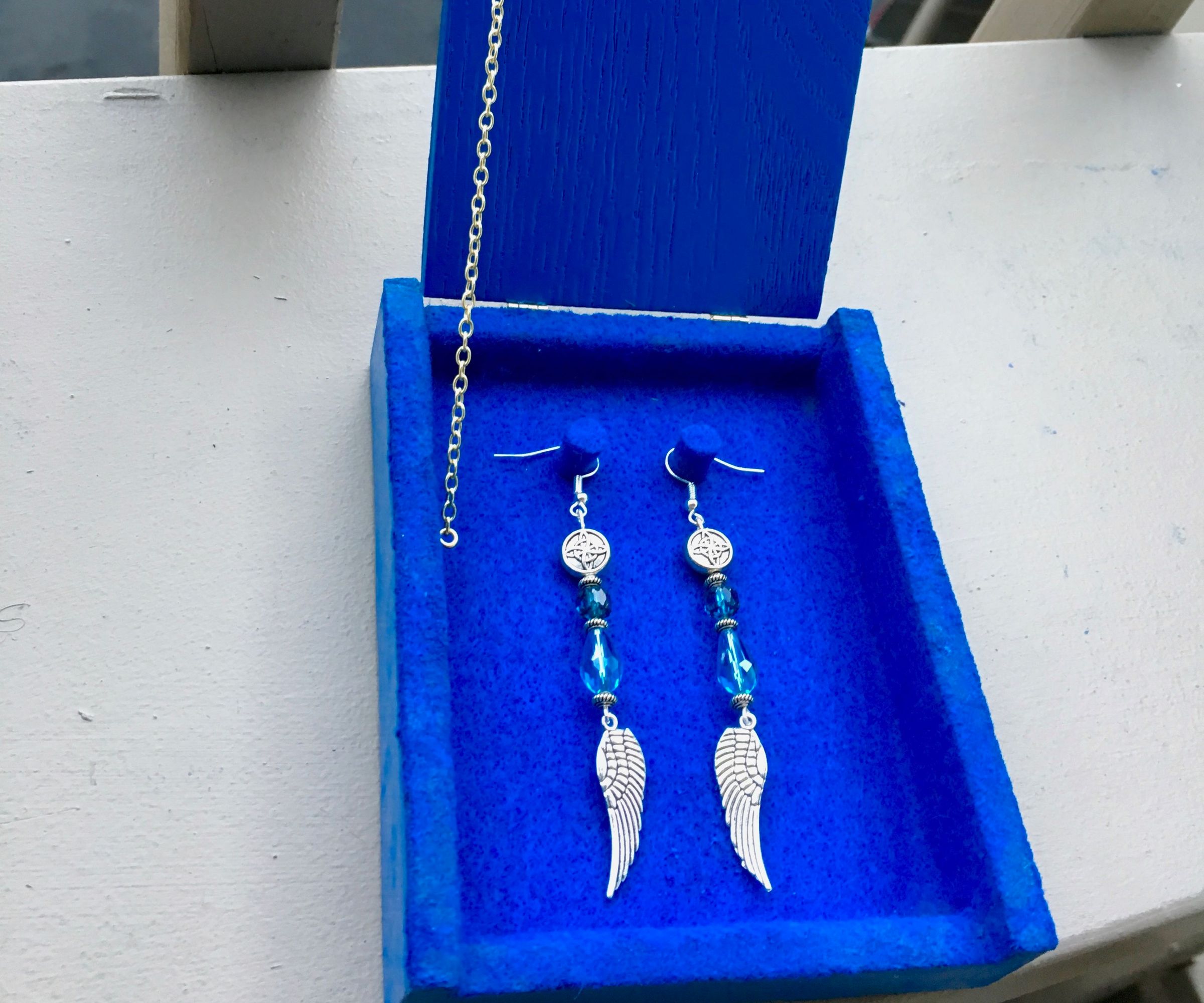Wooden Box With Earrings: an Explosion of Blue