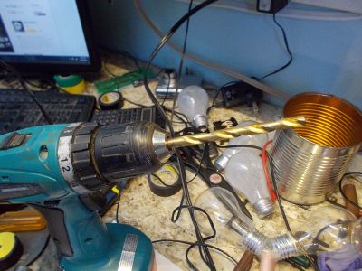 Drill Two Holes for the Wires and Another One for the Switch in the Tall Can