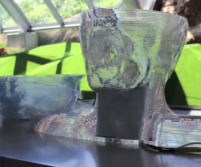 Interactive sculpture (Talking double head by touching plasma ball)