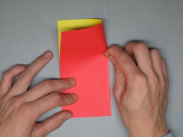 Begin With a Square Sheet of Paper, and Fold in Half.