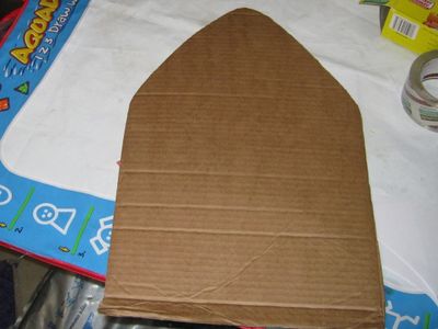 Build Up the Shape of the Shark Around the Balloon Using Cardboard