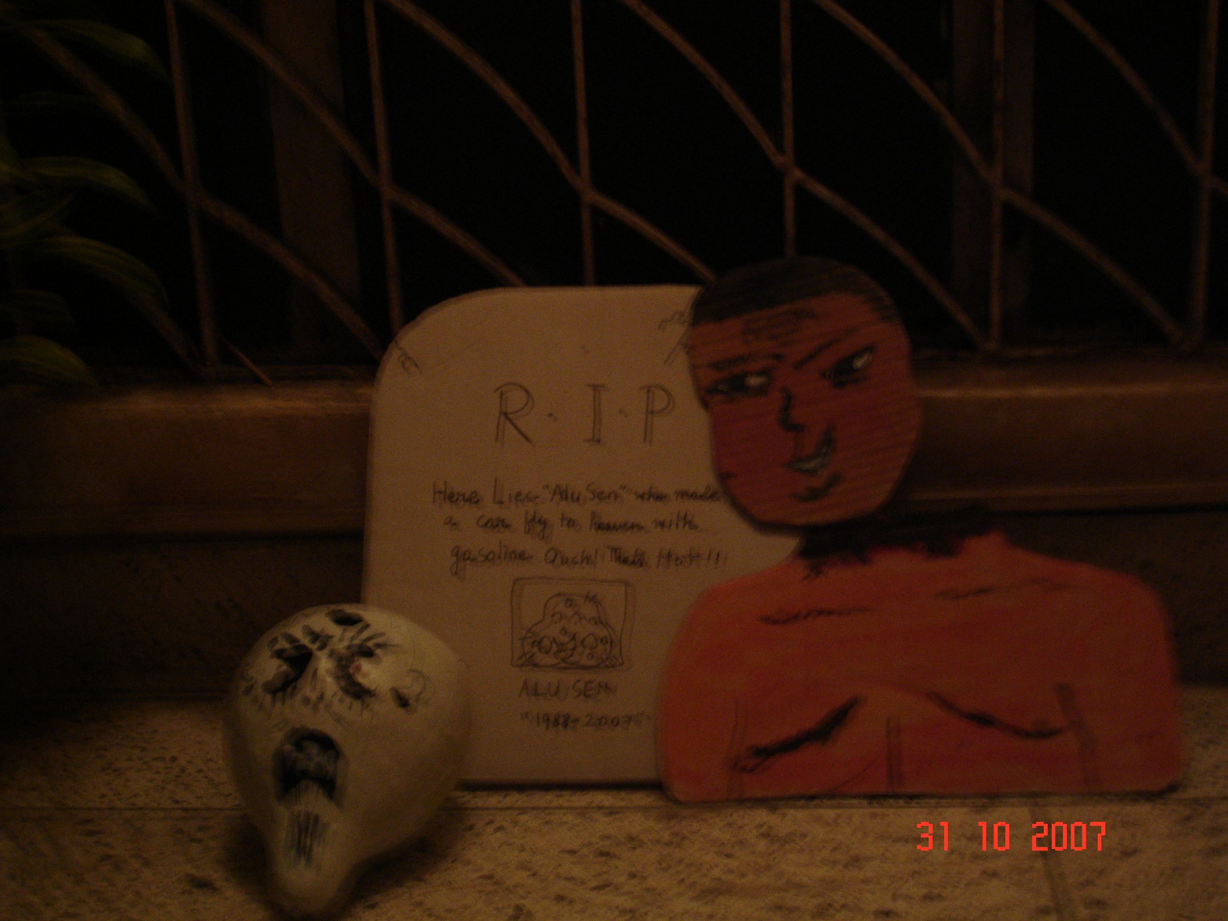 How to Make a Tombstone and a Cut Off Head and Torso Out of Cardboard for Halloween Under $5