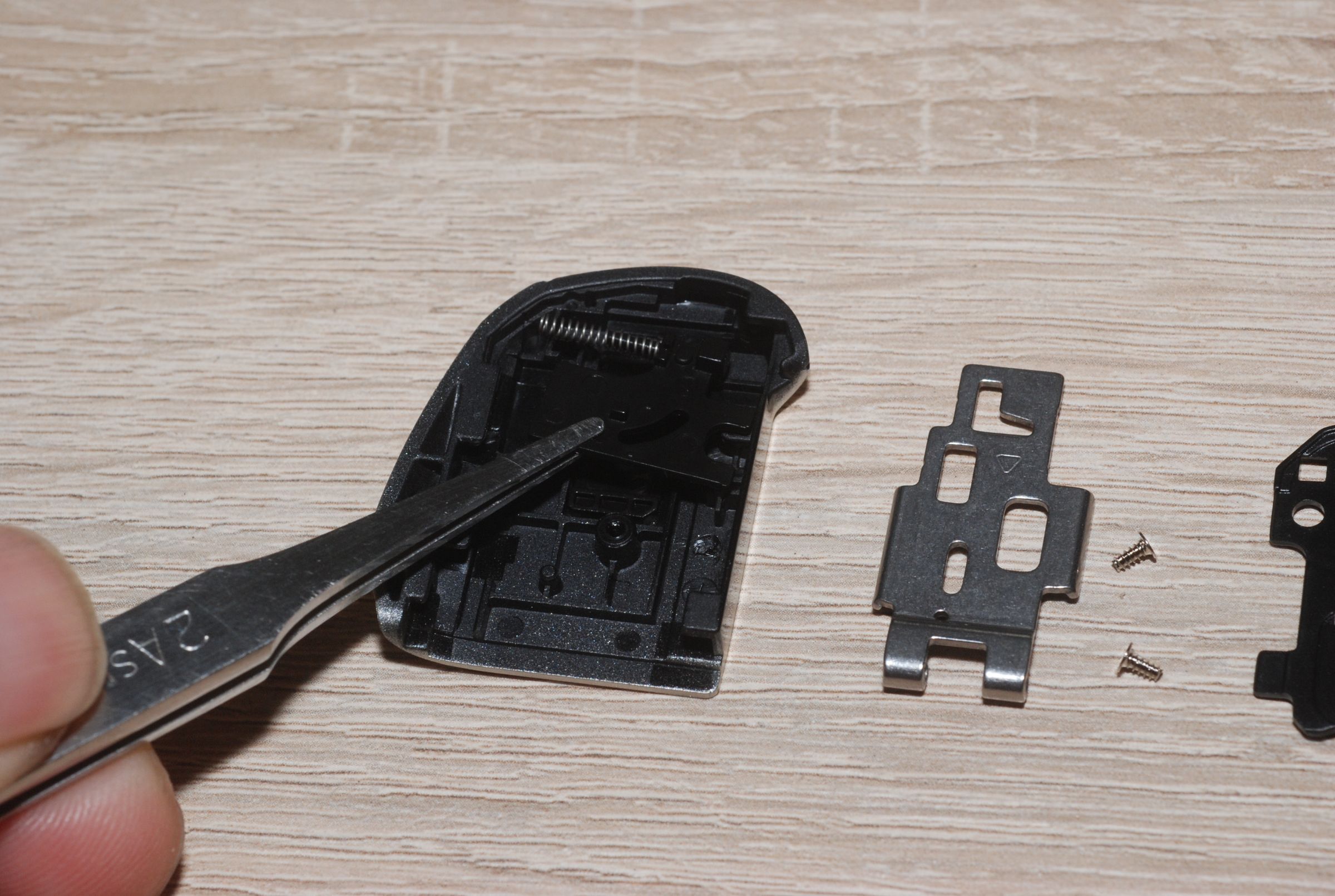 Replacement of Canon PowerShot SX130IS Battery Compartment Door 4