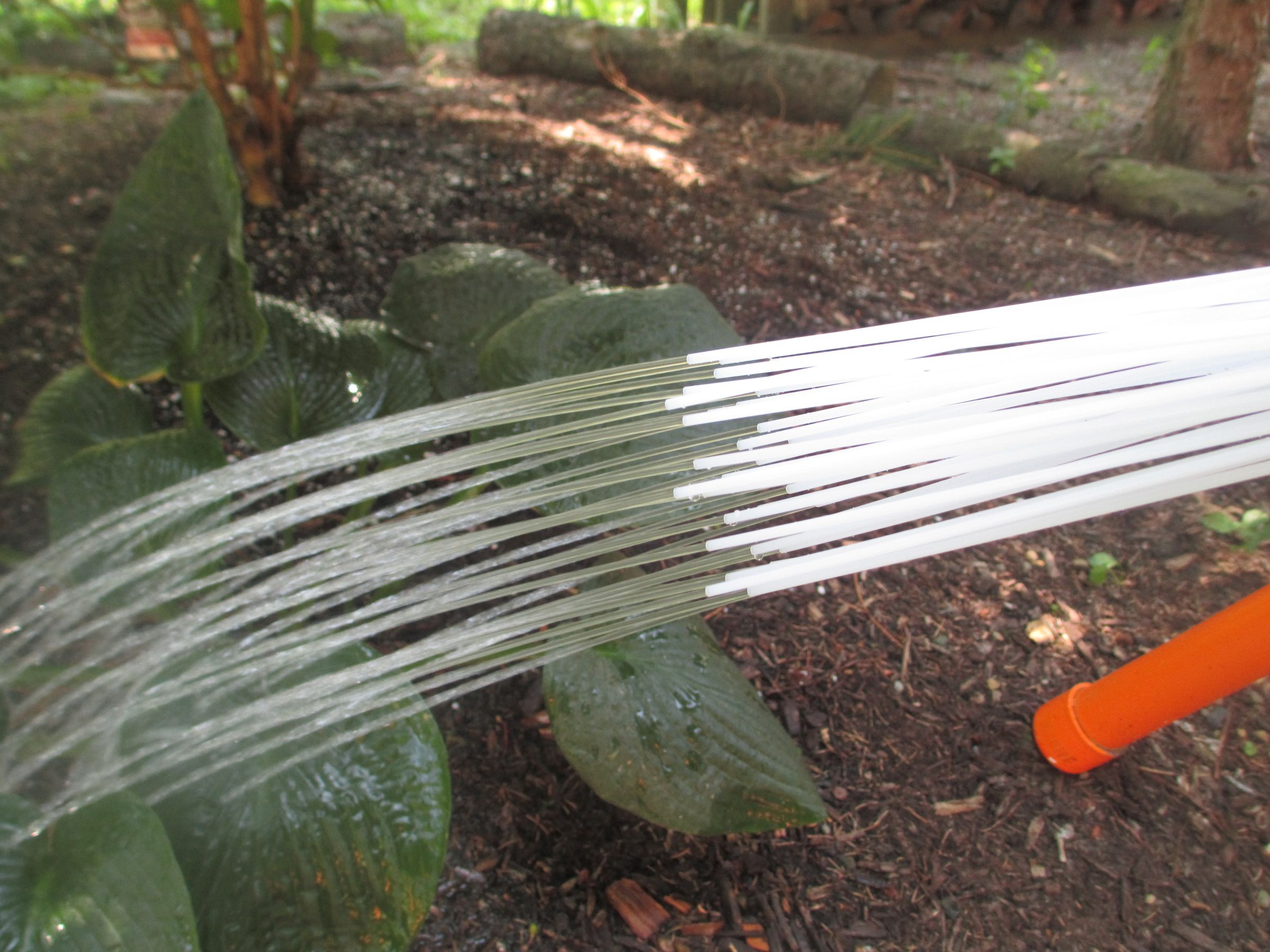 Serendipitous Garden Watering Nozzle From Water Balloon Filler 6