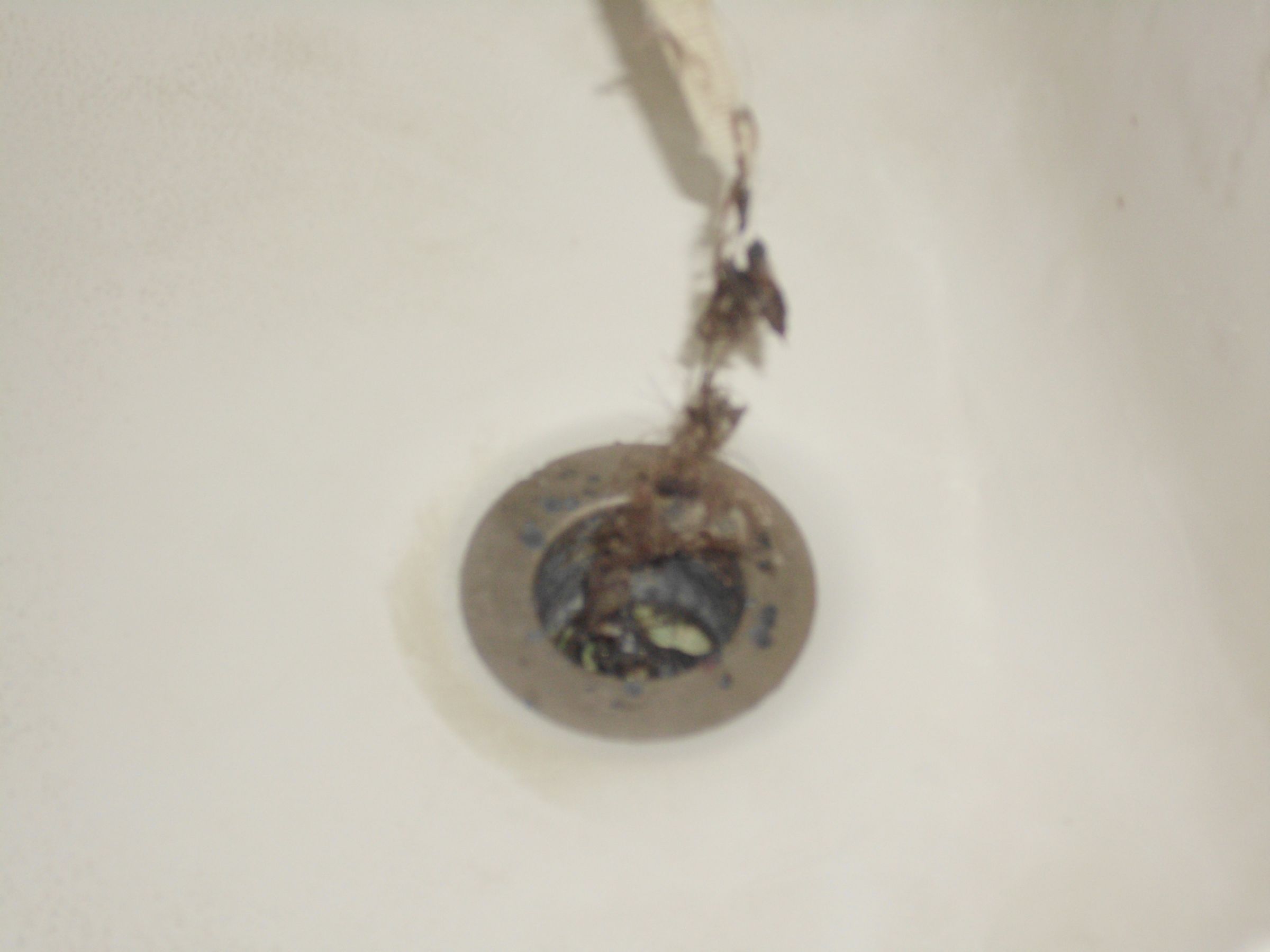 Unclog Your Drain in Two Minutes With This 1 Minute Ziptie Trick