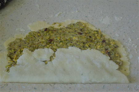 Now Fold the Bottom 1/3 Part of the Rolled Out Dough Upwards.