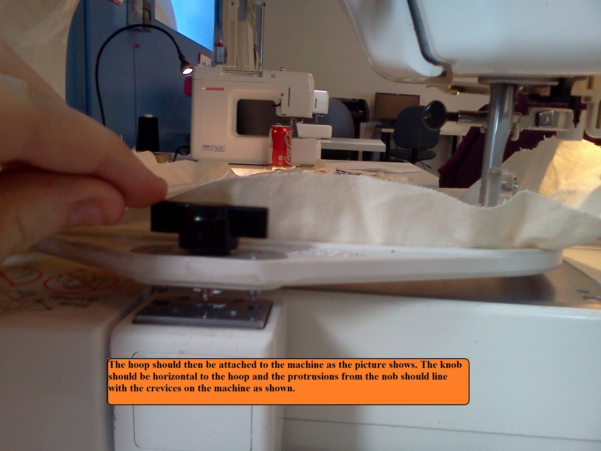 Understanding a Janome Embroidery Machine Setting Fabric in the Hoop