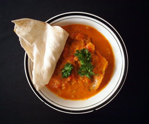 Fish with tomato-coconut curry