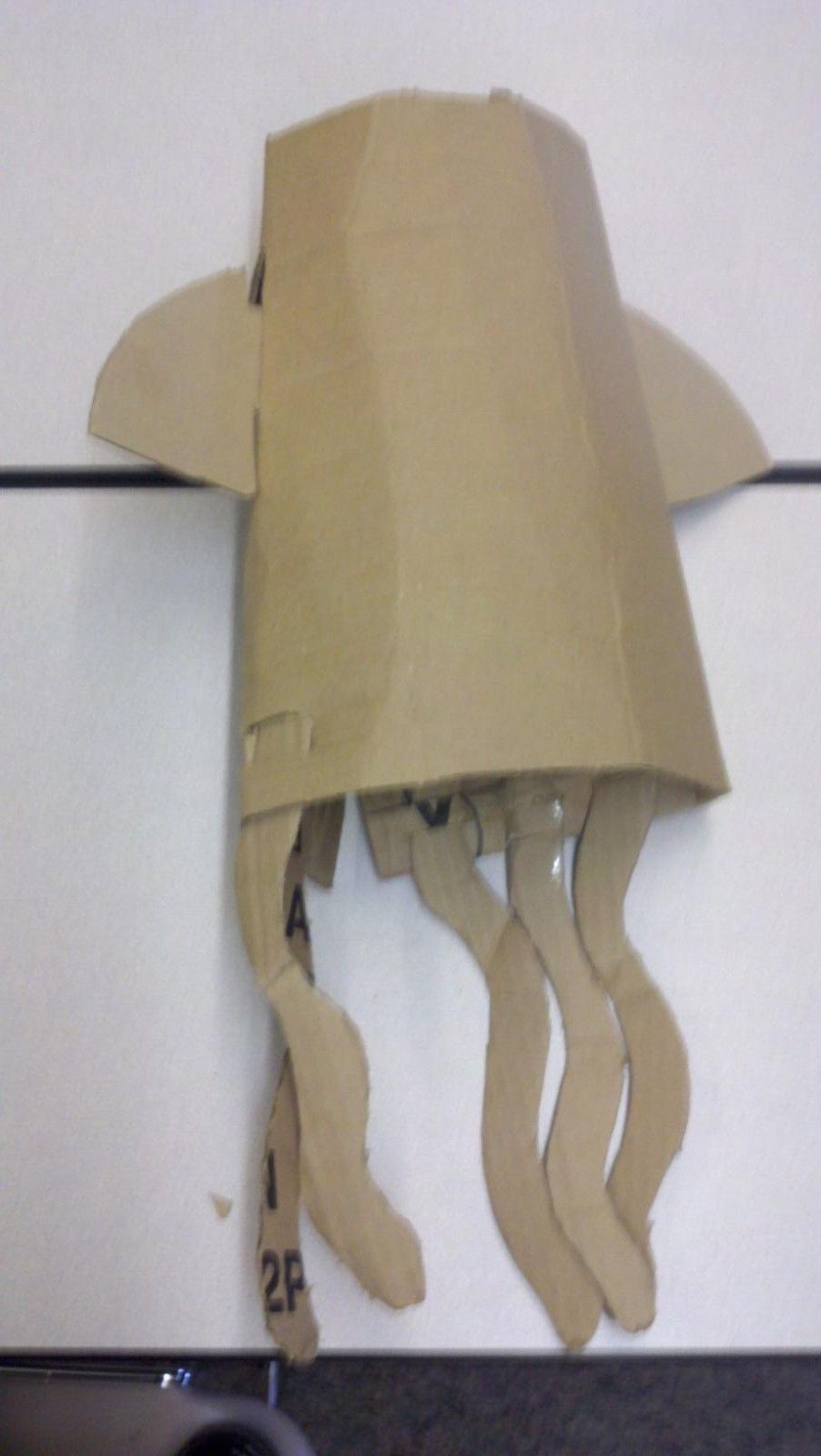Make a Play the Greener Way: How to Make a Cardboard Squid Costume.