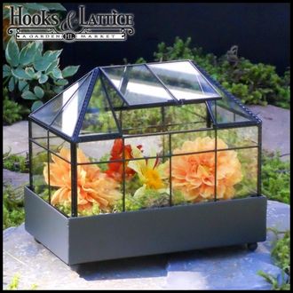 Make the New Leaded Glass Terrarium As Your Very Own Green House Miniature