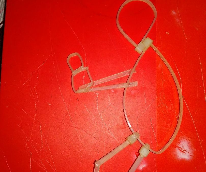 ZIP TIE THIEF WALL HANGING
