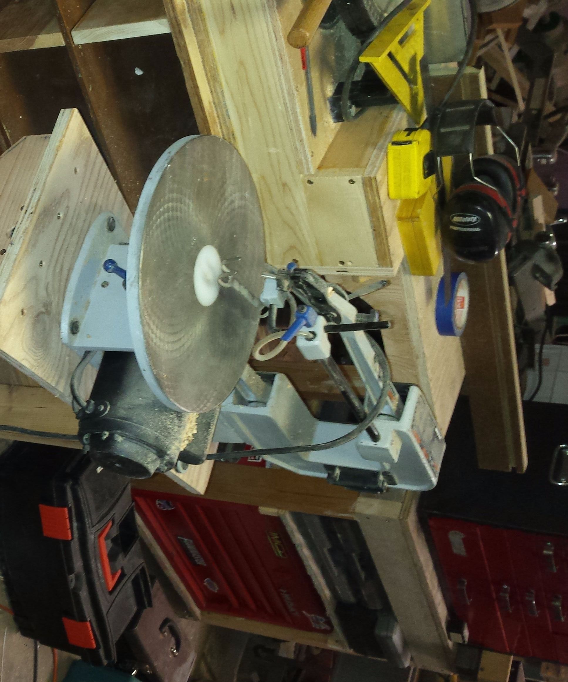 Retractable Casters for a Scroll Saw.