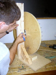 Attach the Wheel to the Arm.