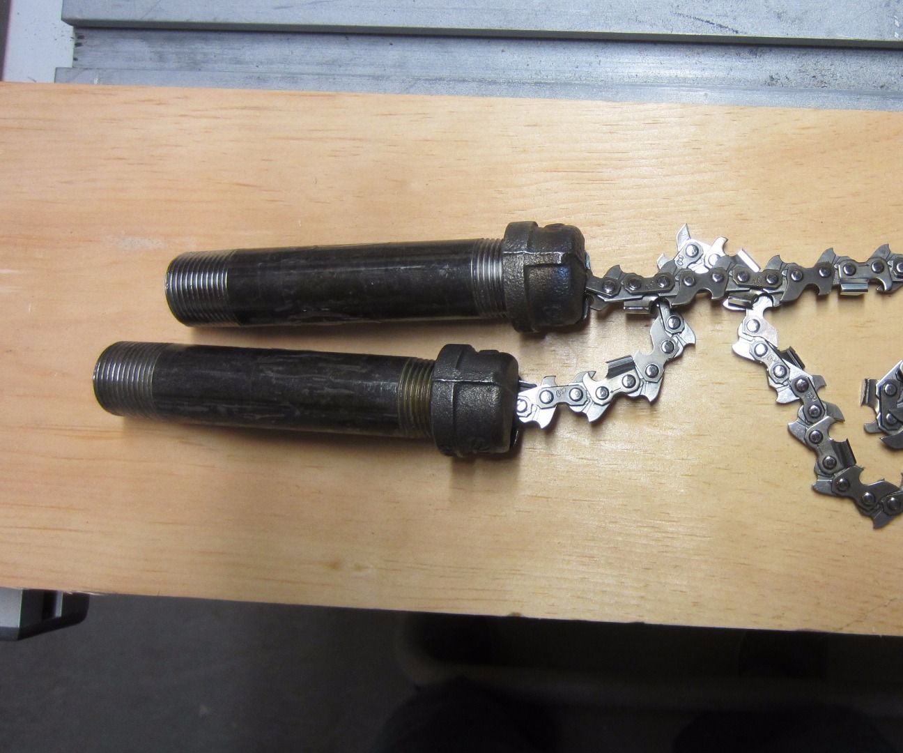Pipe-Handle Manual Chainsaw