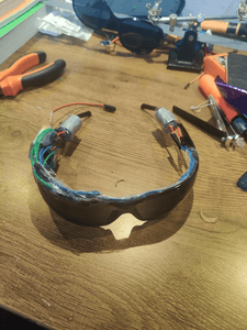 Making Sun Glases With Built-in Bone Conduction Earphones Using Broken Servos and Old Sunglasses -re