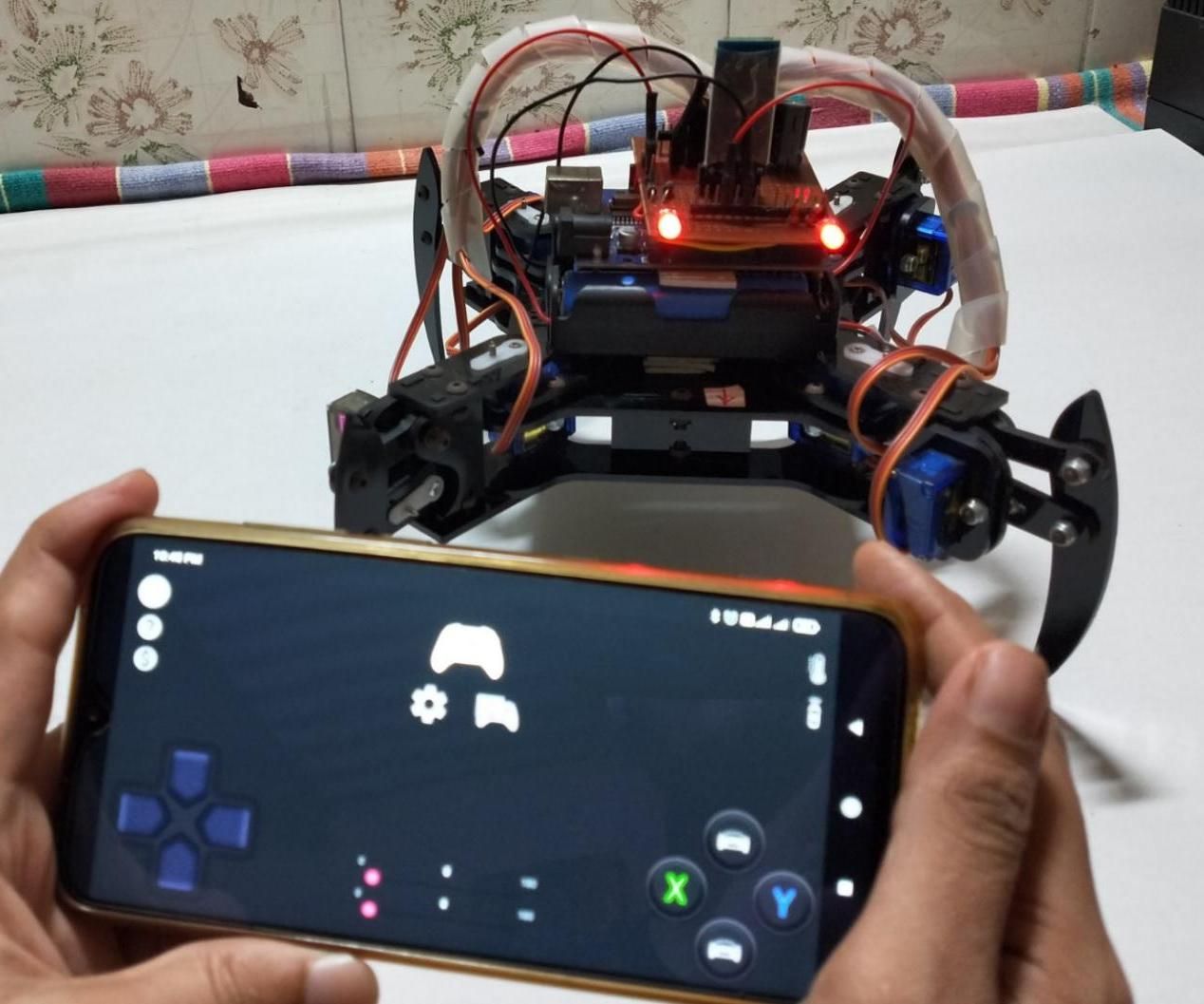 DIY || How to Make a Spider Robot Which Can Be Controlled Using Smartphone Using Arduino Uno