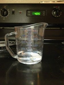 Fill the Cup With Just Enough Water to Completely Cover the Object
