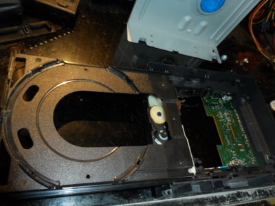 Retirar Unidad Óptica / Remove Optical Drive