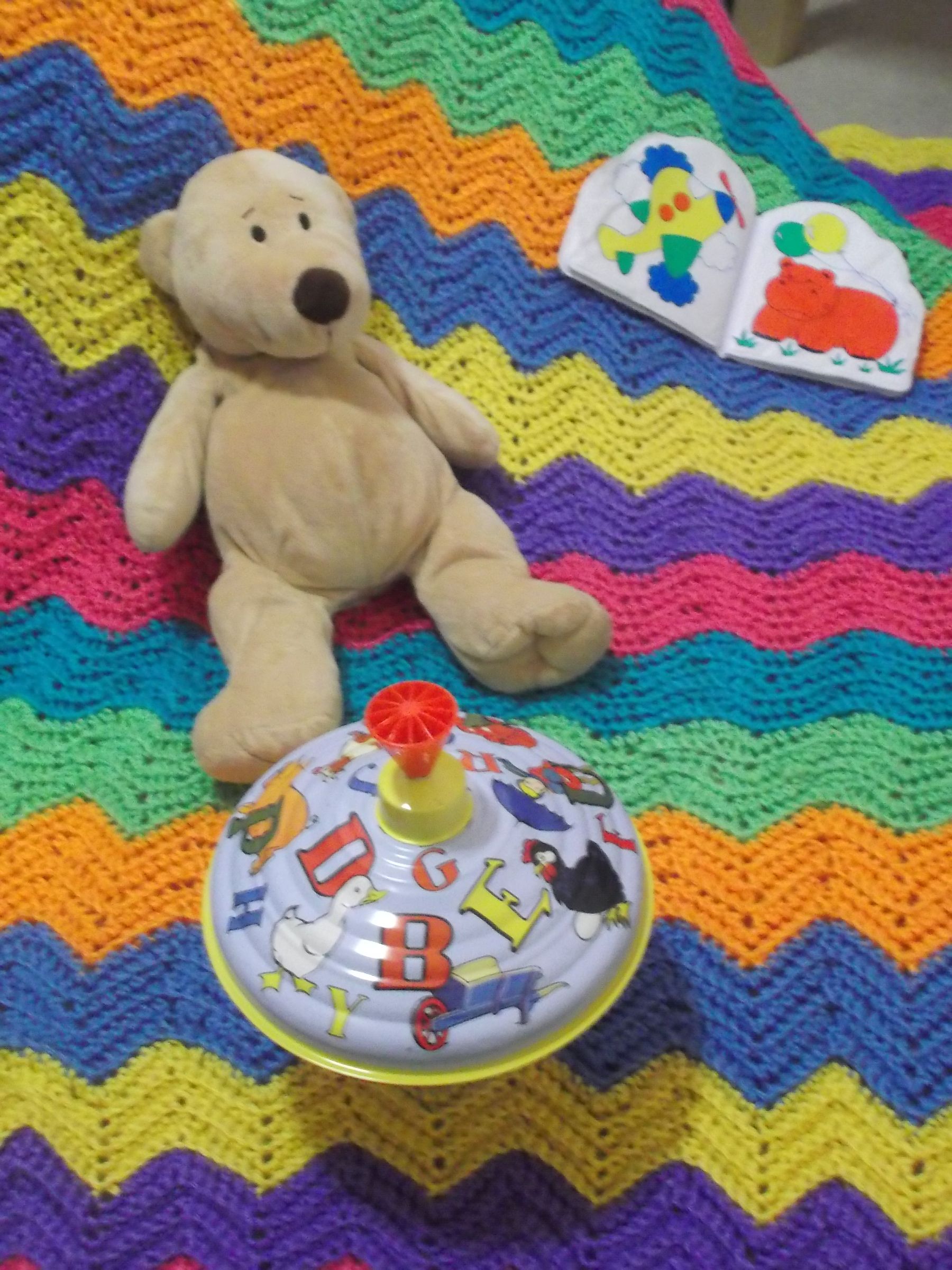 How To Crochet A Colorful, Wavy, Striped Baby Blanket
