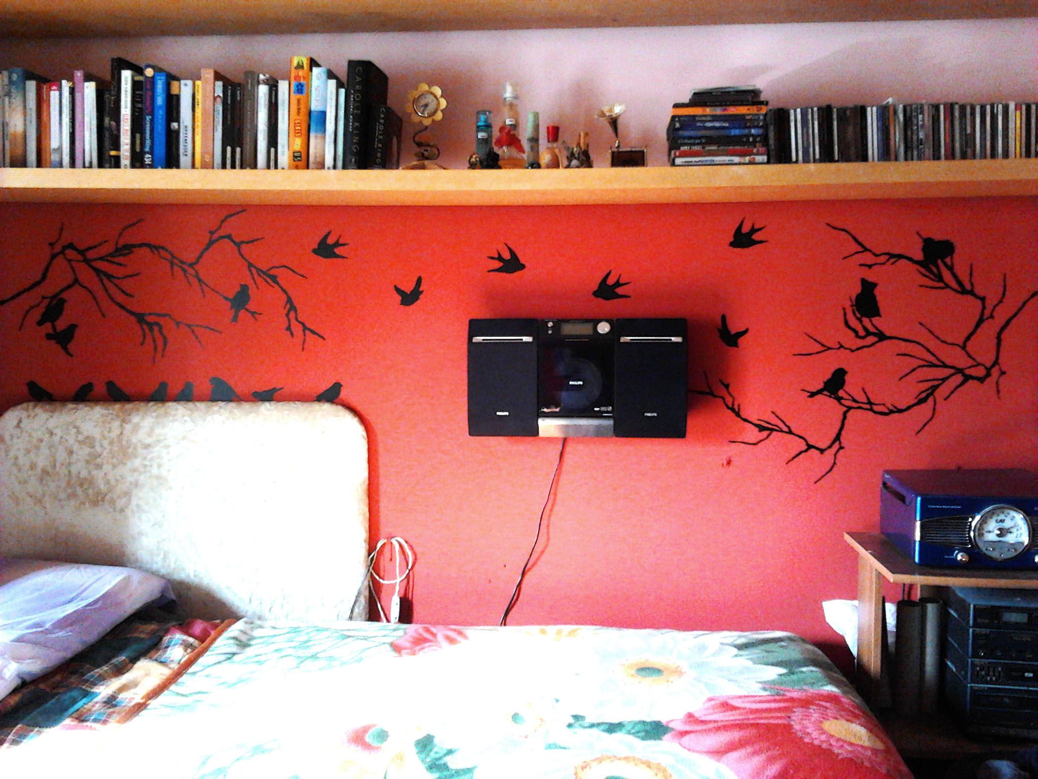 Red Wall With Birds and Branches