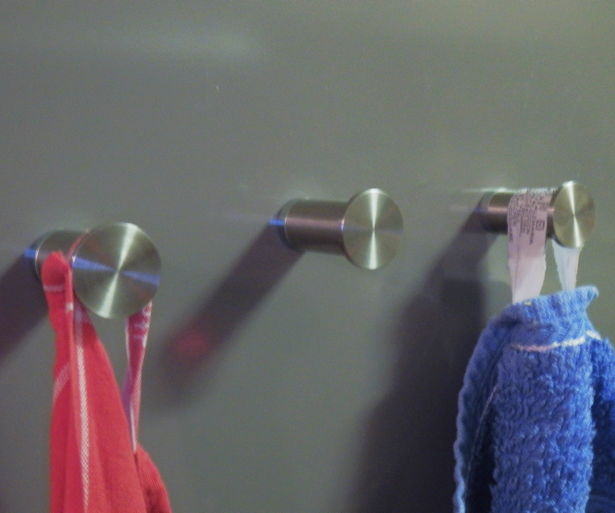 Magnetic kitchen towel hanger