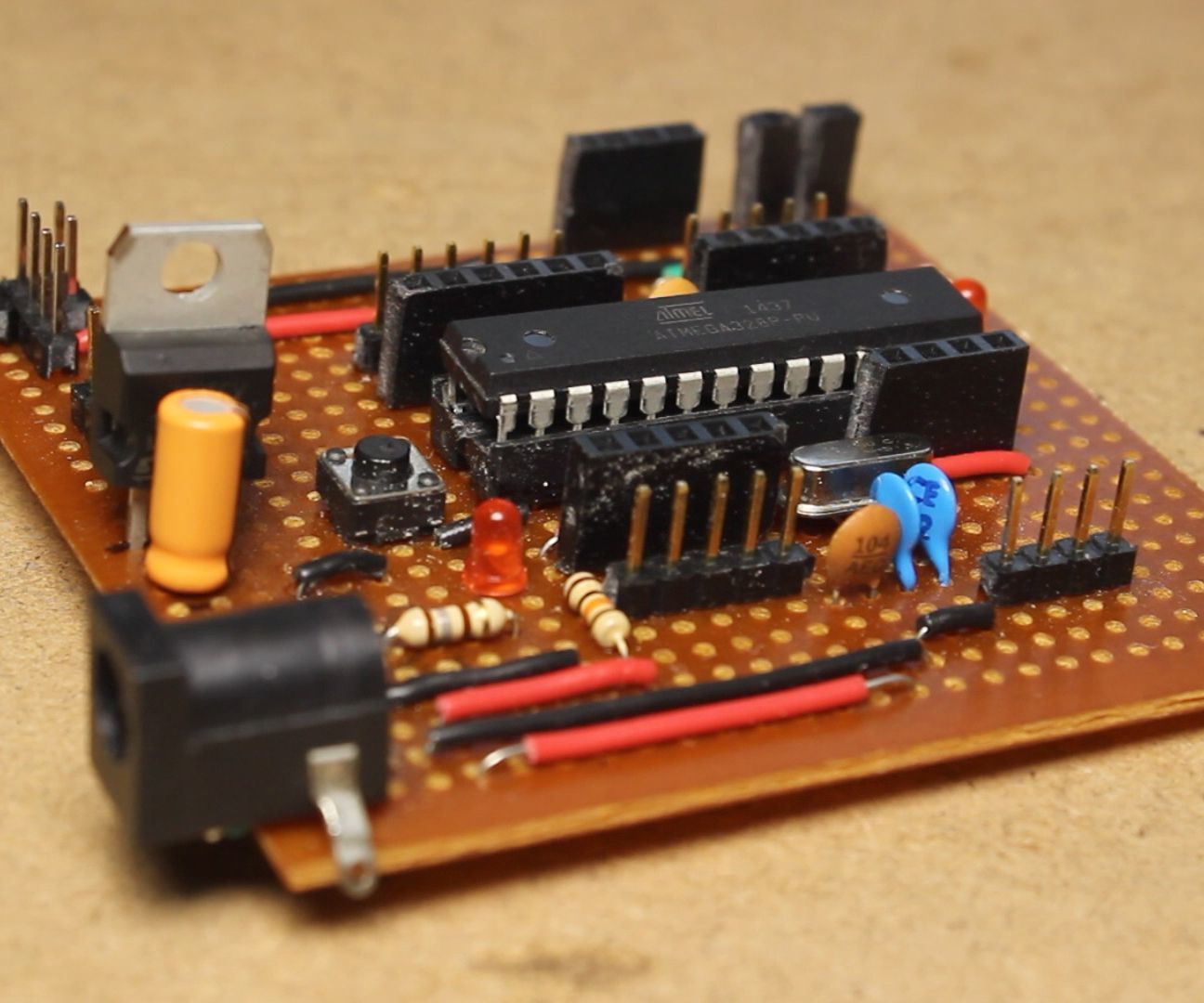 How to Make Your Own ARDUINO UNO Board ( Breadboard - Veroboard - Programming )