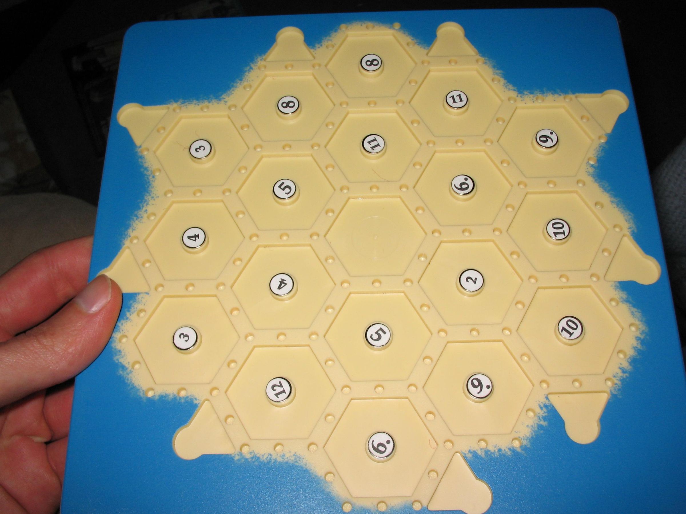 Modifying Settlers of Catan Travel Edition to Include Customizable Numbered-Spaces