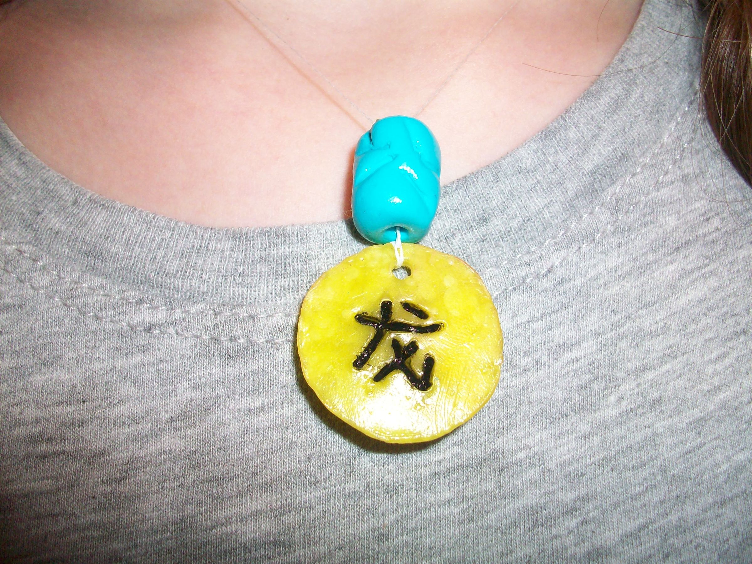 Chinese zodiac clay pendant