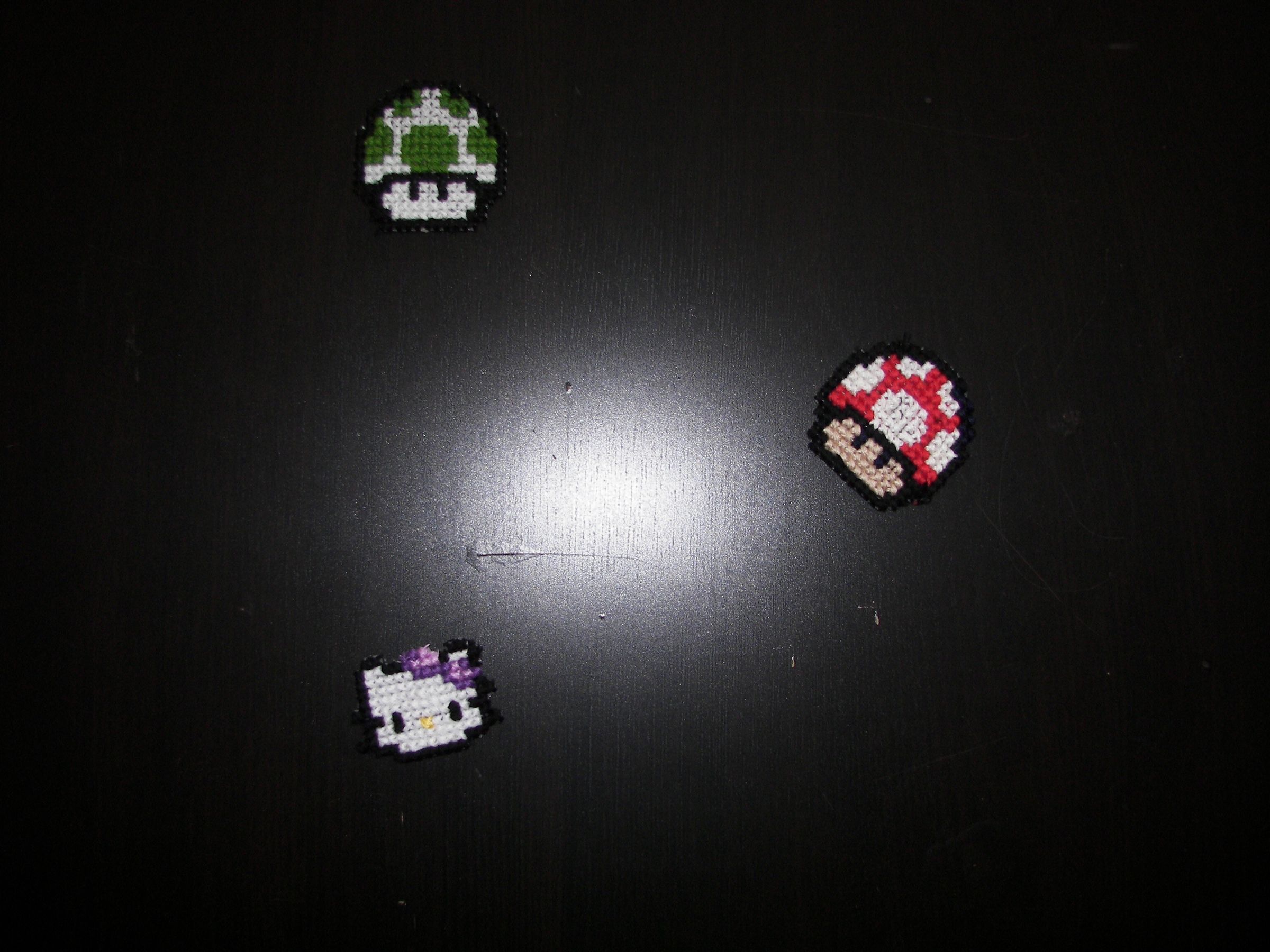 Counted cross-stitch fridge magnets
