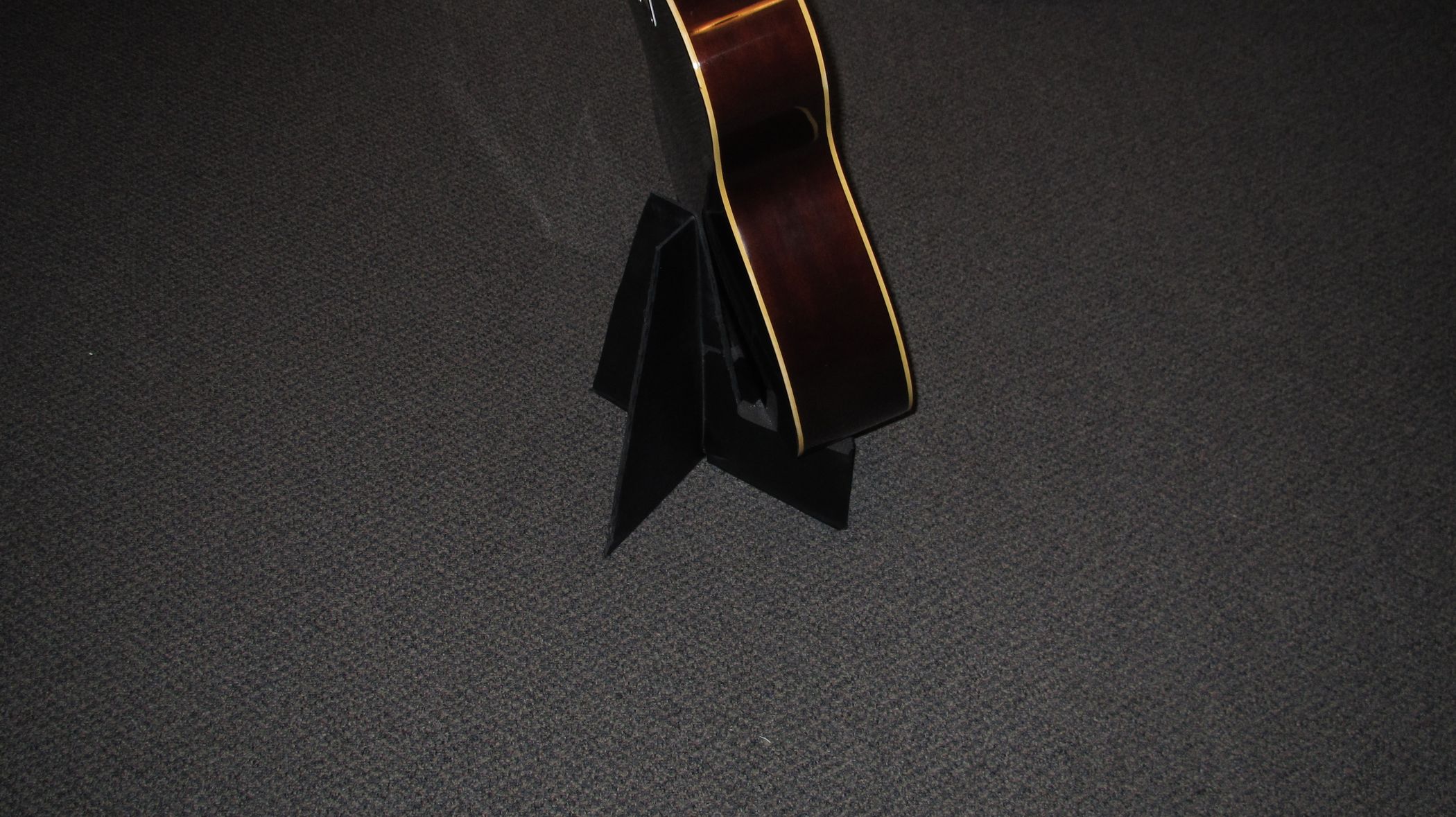 This Guitar Stand Conceals a Hidden Secret That Every Guitarist Needs