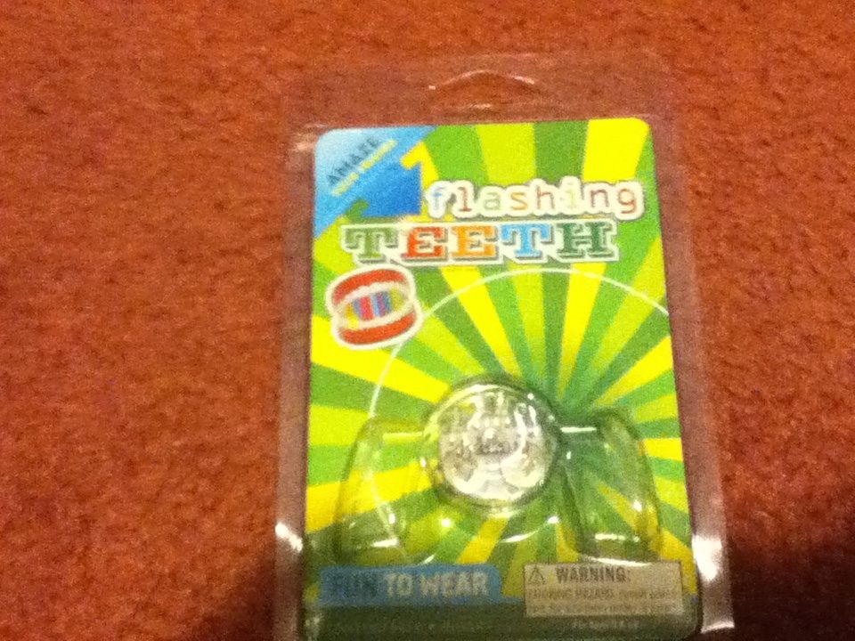 How to Replace Batteries in Flashing Teeth Toy