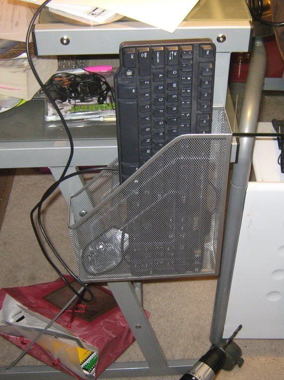 Stylish Mounted Keyboard Storage From a Cheap Magazine Holder