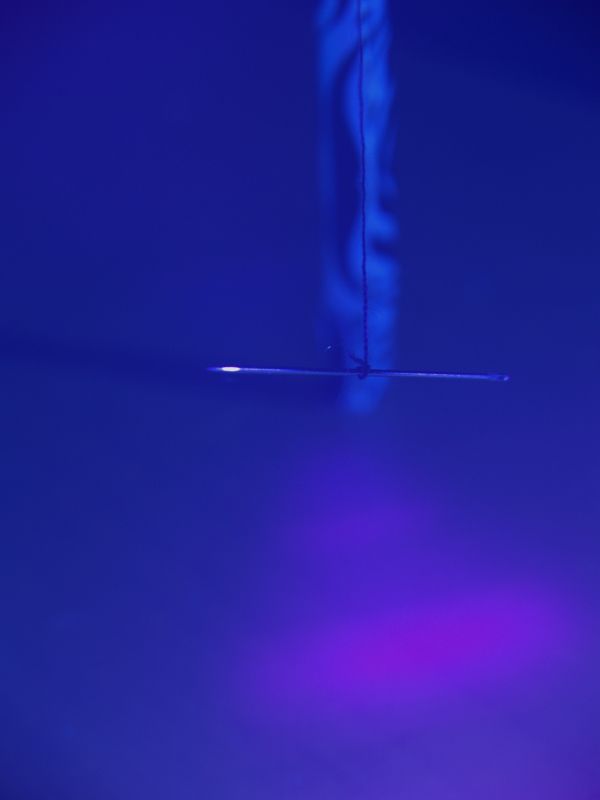 Under UV Light Duct Tape Tripod Compass