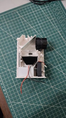DISASSEMBLING THE OPTICAL SYSTEM