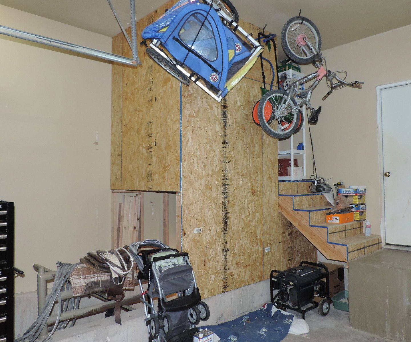 Small Wasted Space Idea Above Basement Stairs in Garage