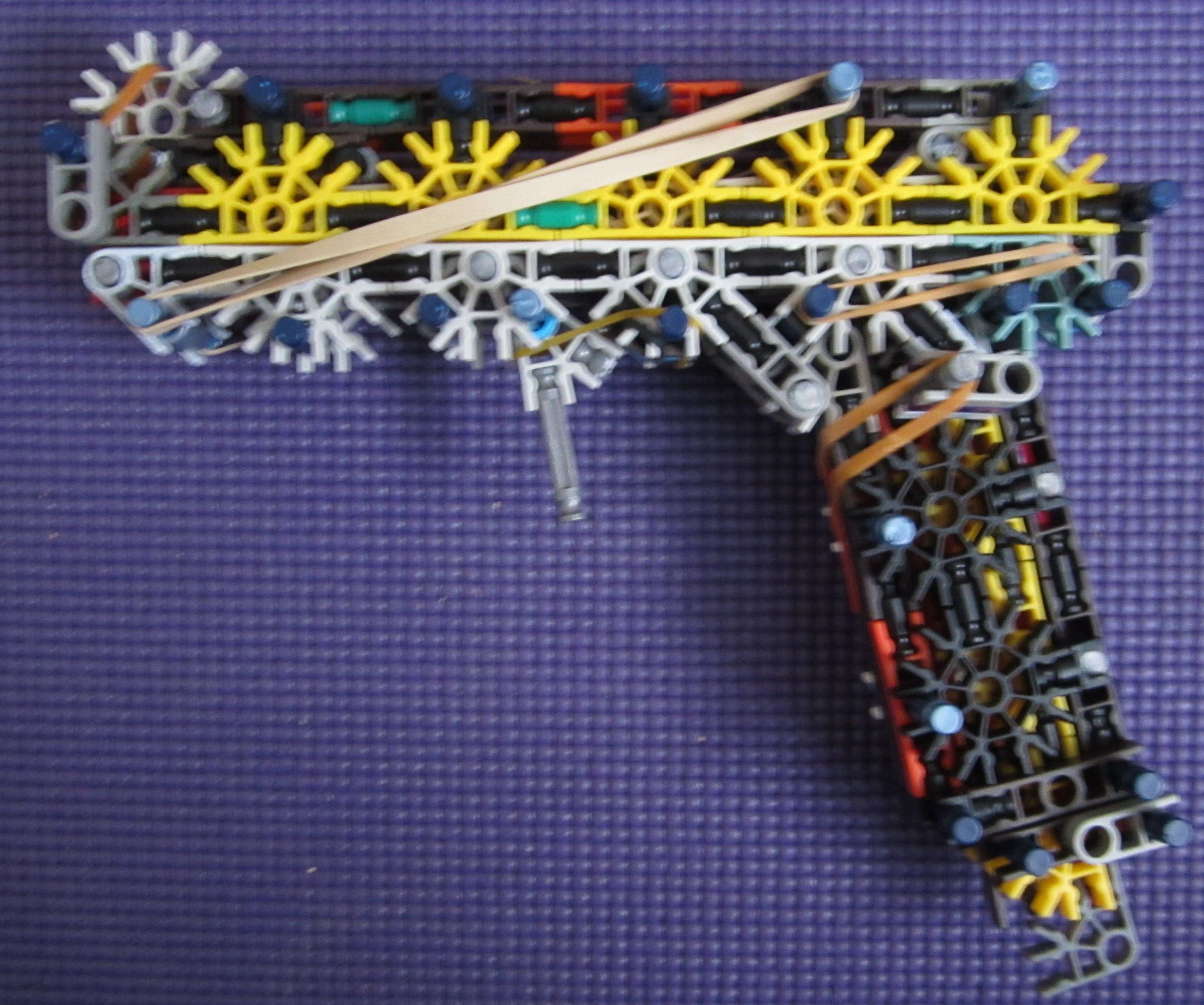 Slide Action Self-Contained Pistol