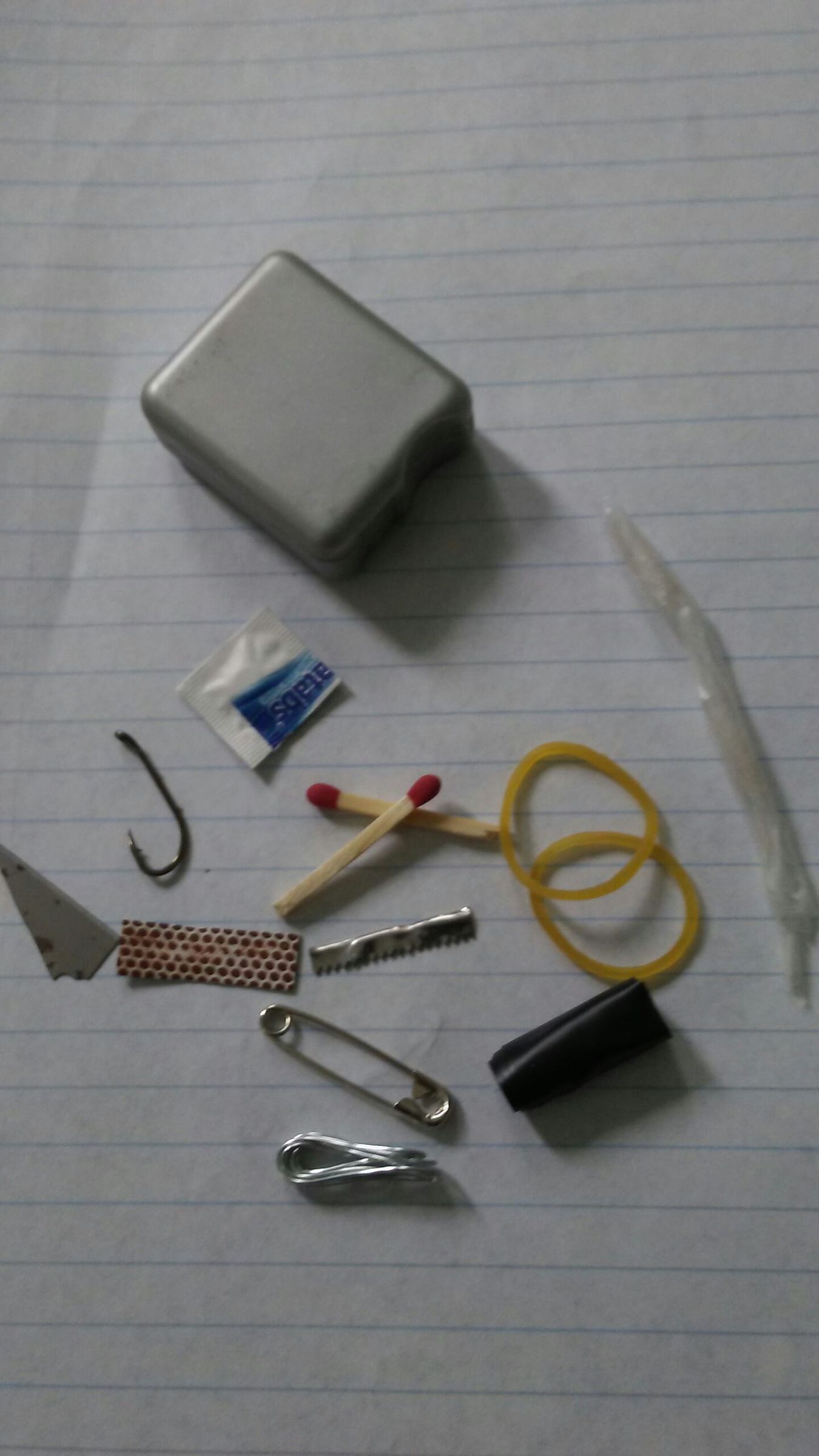 Survival Kit in a Floss Container